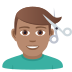 💇🏽‍♂️ man getting haircut: medium skin tone display on JoyPixels